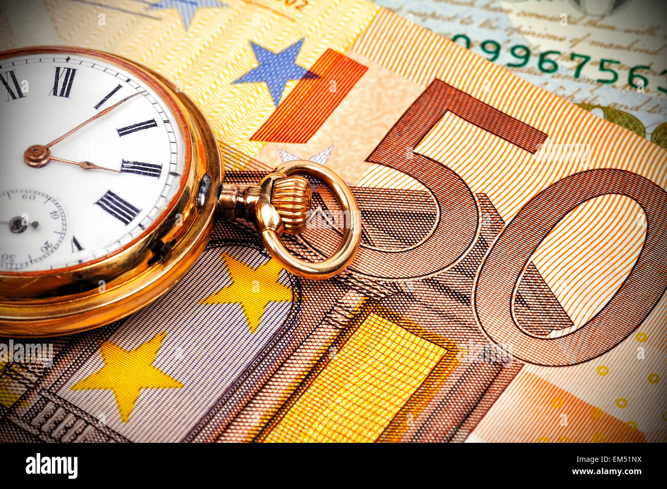 Montre en or et euro bills, Close up Banque D'Images