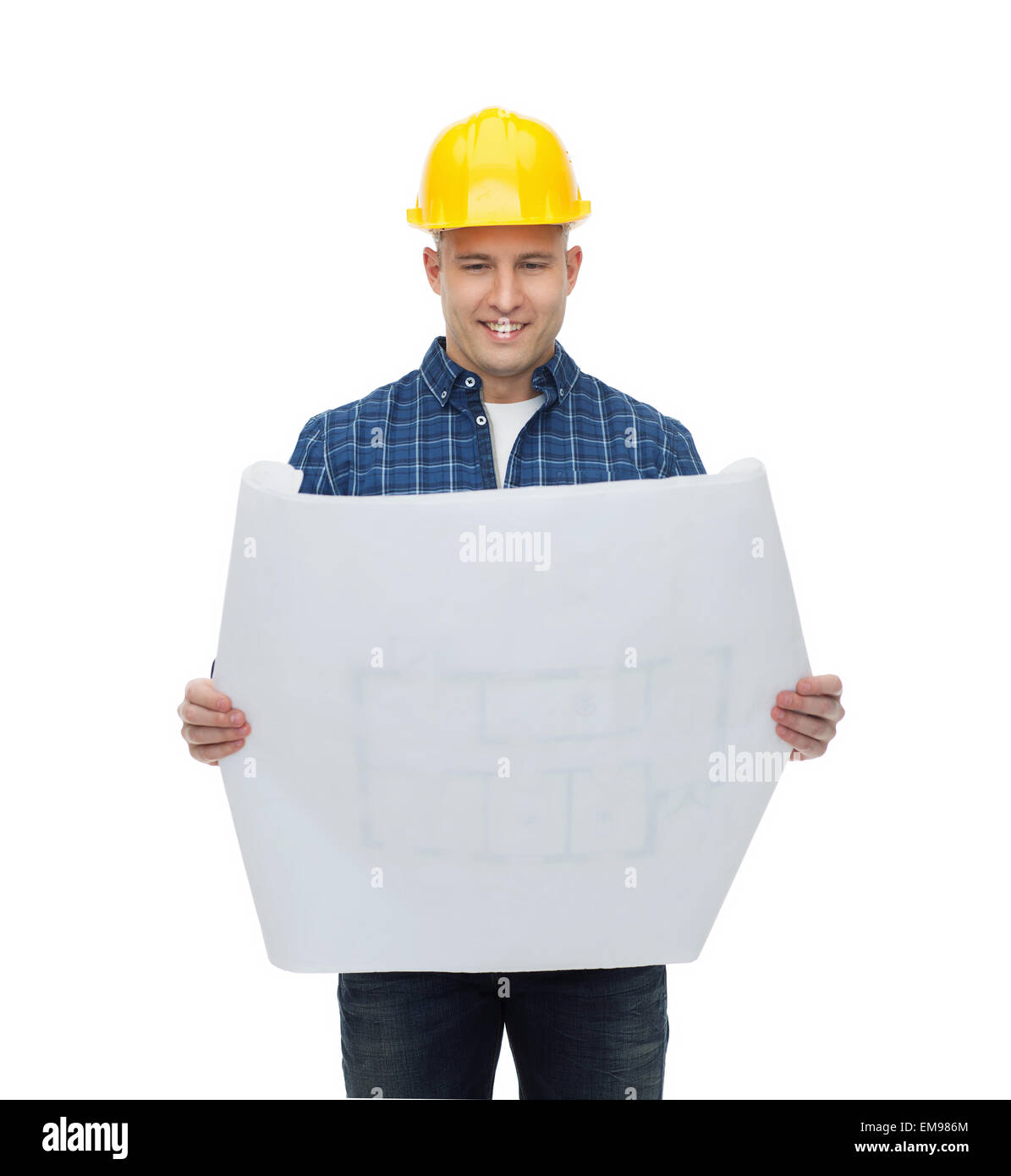 Male builder en casque avec blueprint Banque D'Images