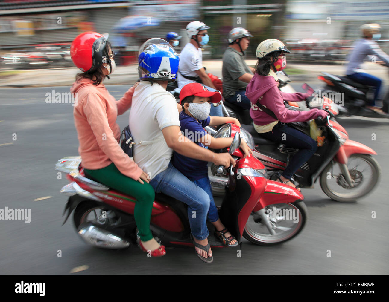 Vietnam, Ho Chi Minh Ville, Saigon, les gens sur la moto, Banque D'Images