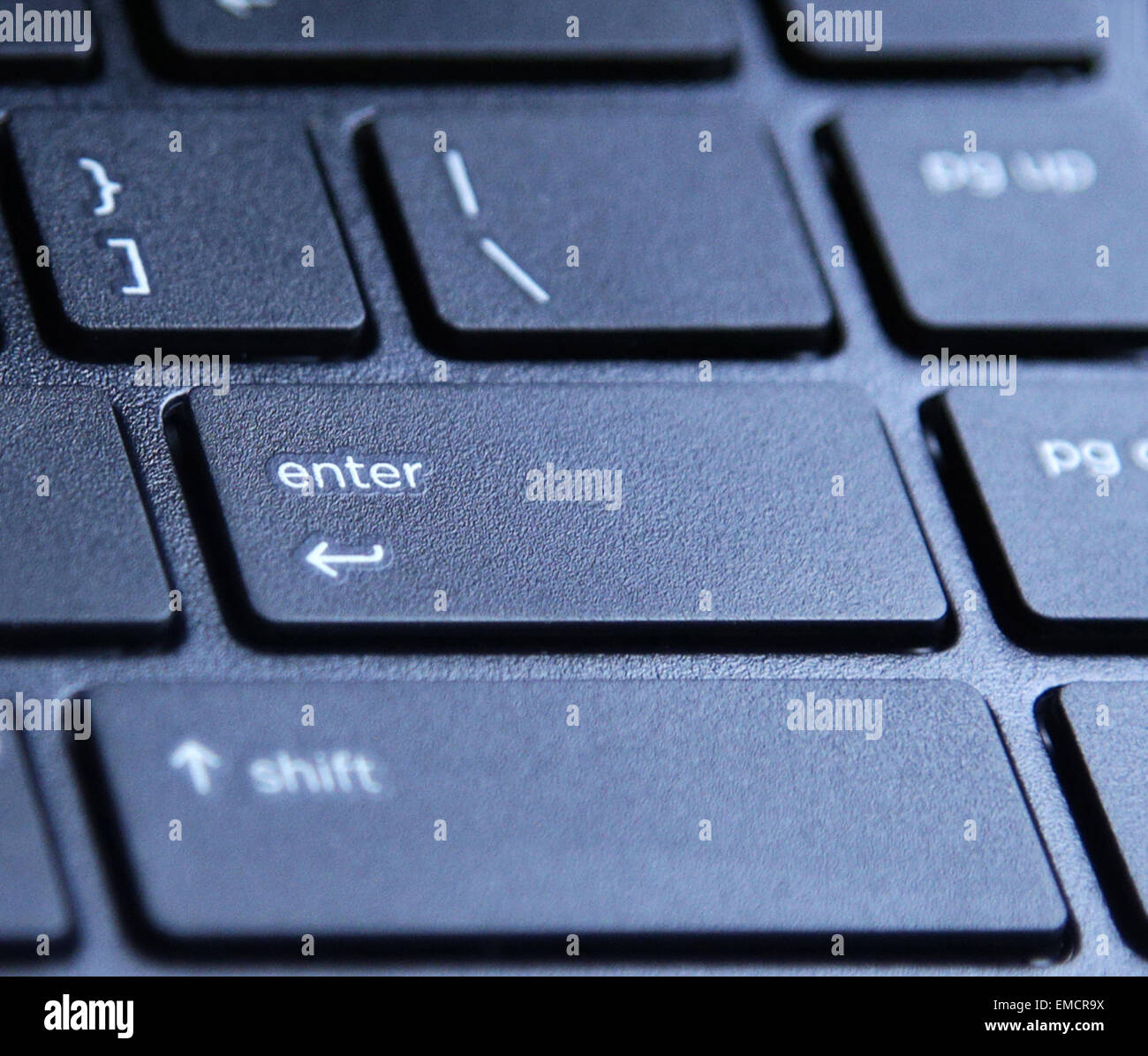Ordinateur portable avec clavier bouton touche entrée en surbrillance Photo  Stock - Alamy
