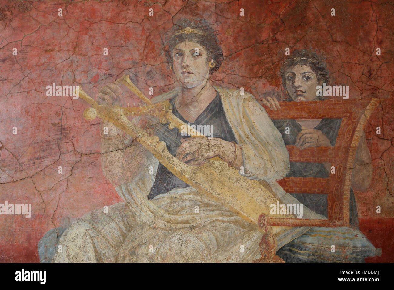 Peinture murale d'une salle de réception. Roman.50-40 BC. Villa de P. Fannius Synistor à Boscareale, Italie. Femme jouant Khitara Banque D'Images