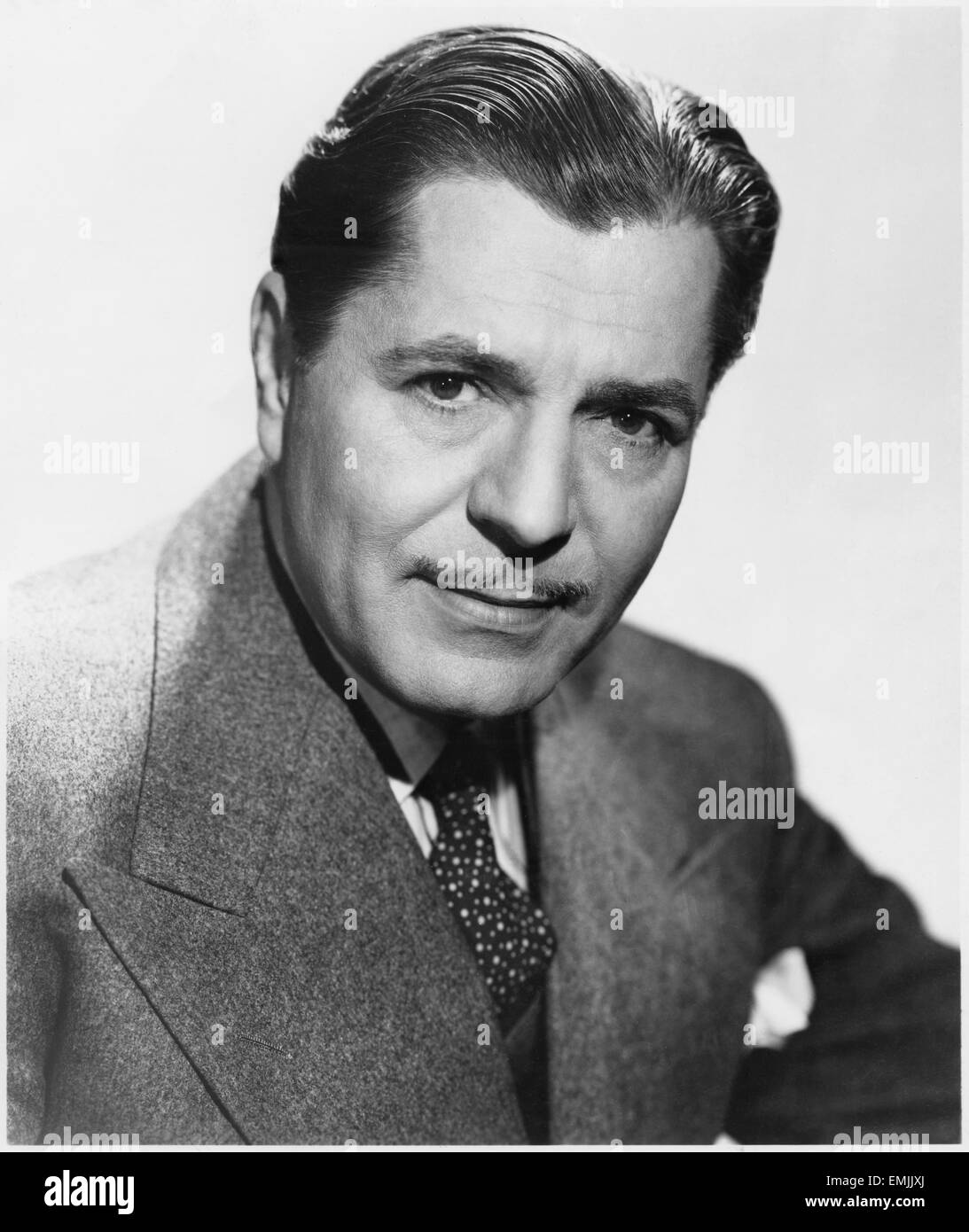 Warner Baxter, Portrait publicitaire pour le film "Lady in the Dark', 1944 Banque D'Images