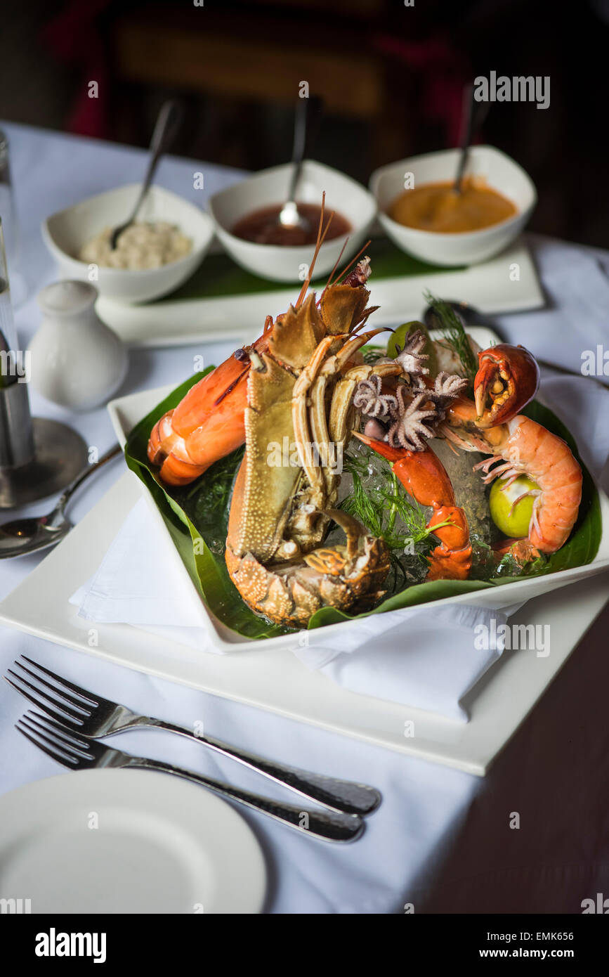 Avec la création de fruits de mer au restaurant gastronomique Malabar Junction, le Boutique Hotel Malabar House, Fort Kochi, Kerala, Inde Banque D'Images Avec la création de fruits de mer au restaurant gastronomique Malabar Junction, le Boutique Hotel Malabar House, Fort Kochi, Kerala, Inde Banque D'Images