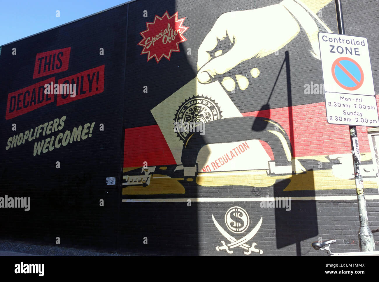 Street art par l'artiste Shepard Fairey à Shoreditch, East London Banque D'Images