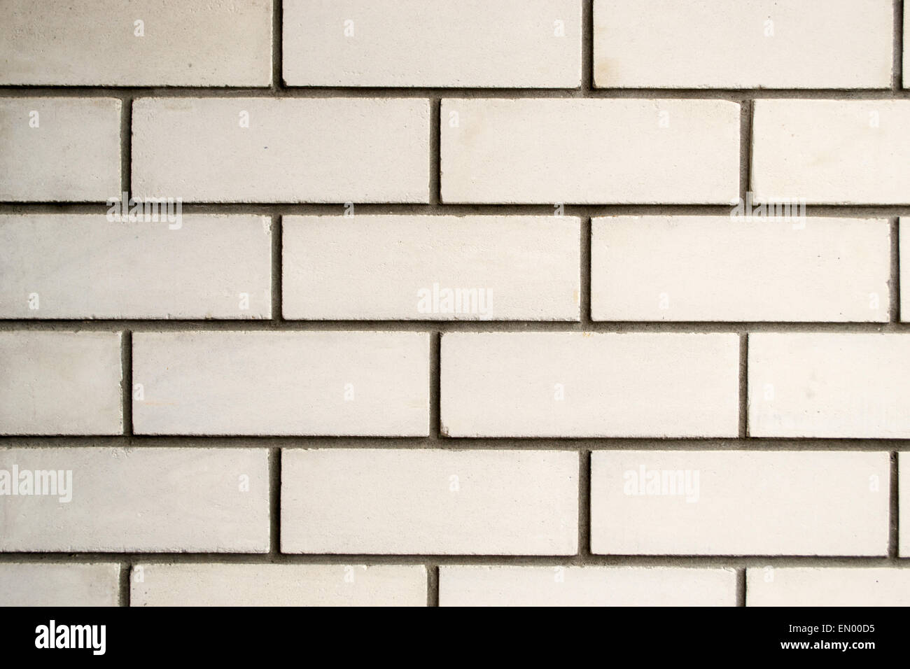 Brique en pierre blanche avec mur de ciment Le ciment gris Banque D'Images