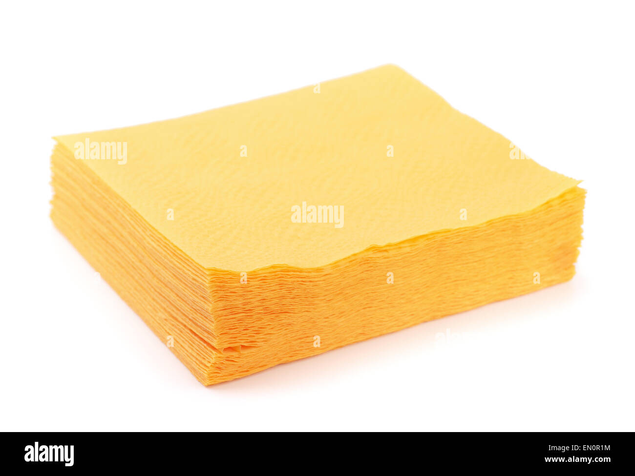 Pile de serviettes en papier jaune isolated on white Banque D'Images