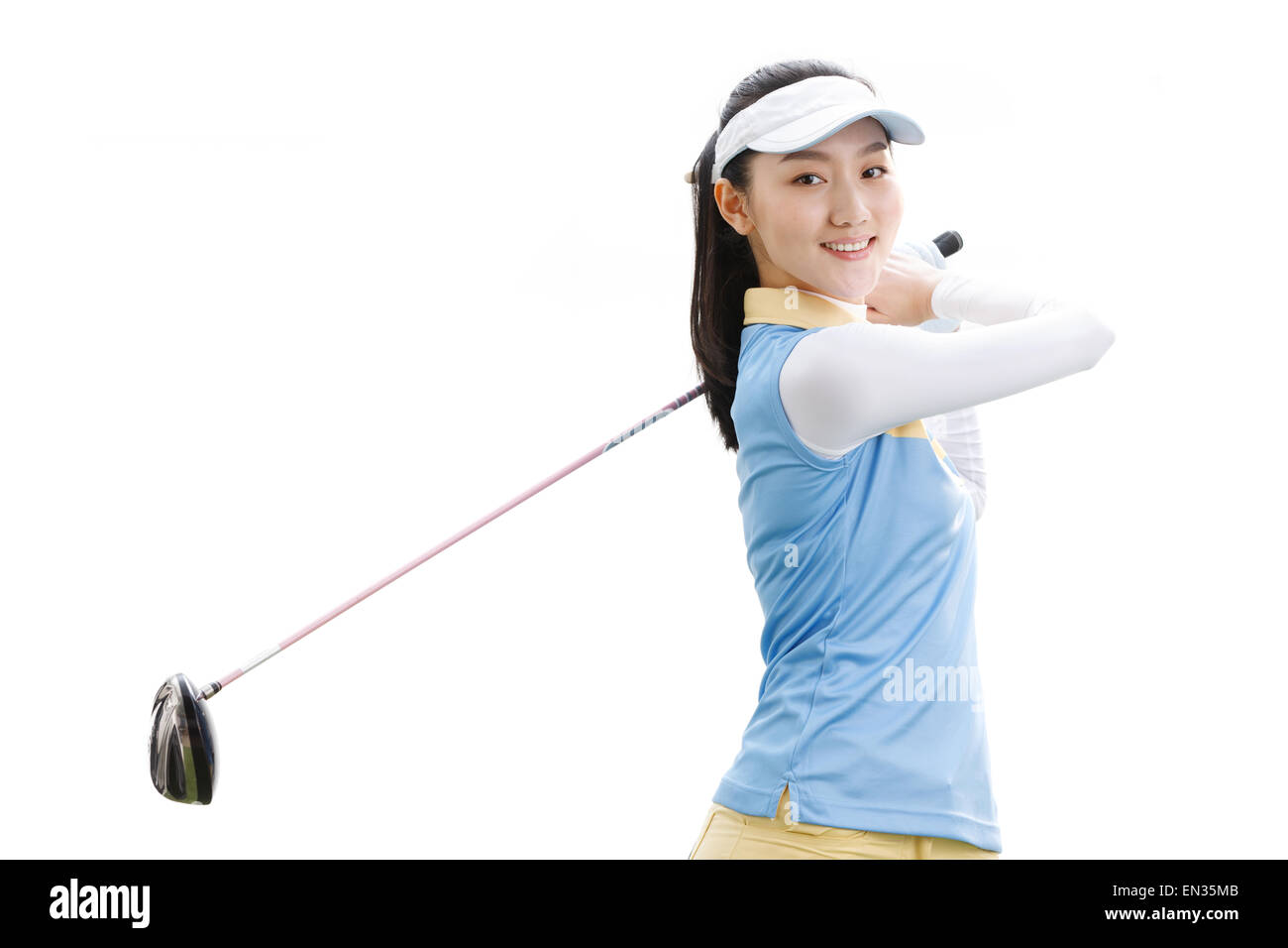 La jeune femme jouer au golf Banque D'Images