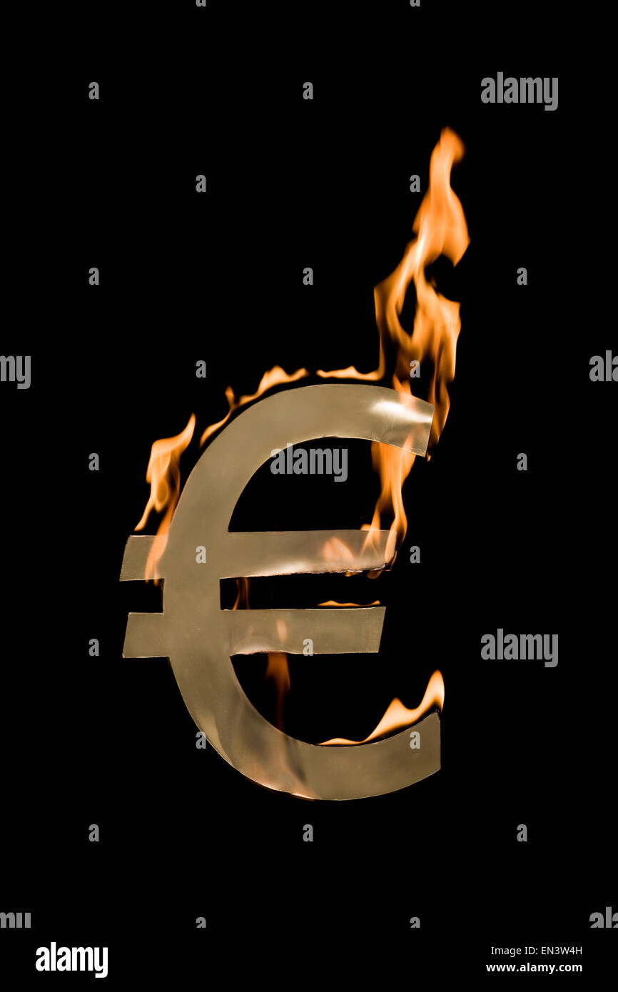 Symbole monétaire en feu Banque D'Images