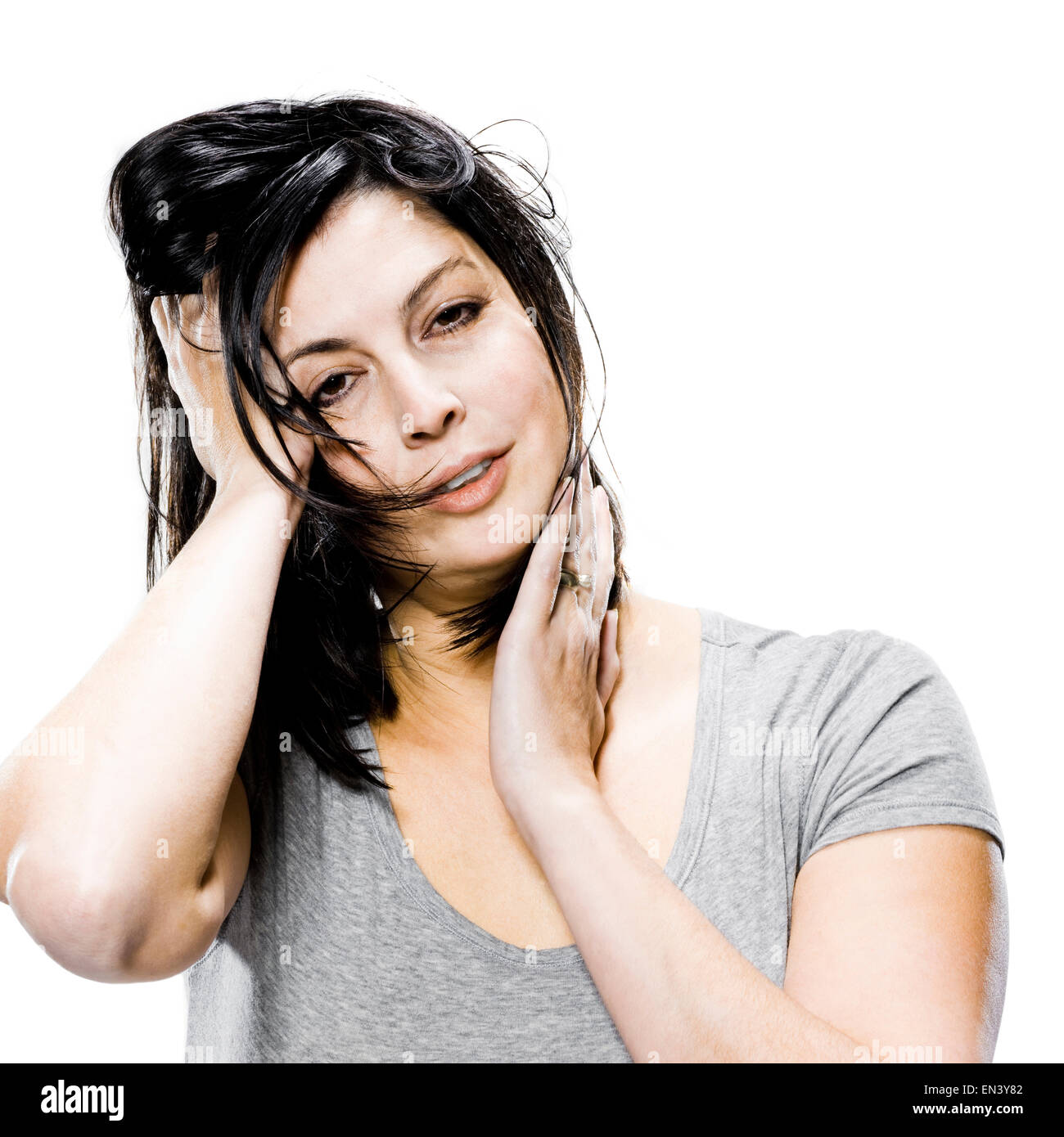 Femme avec ses mains sur sa tête Banque D'Images Femme avec ses mains sur sa tête Banque D'Images