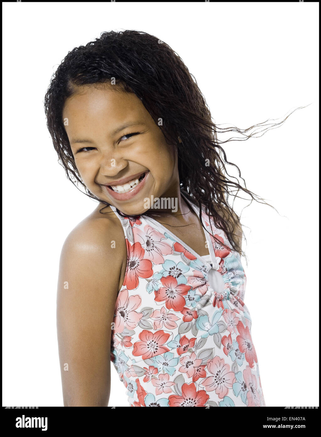 Jeune fille dans une robe à fleurs Banque D'Images