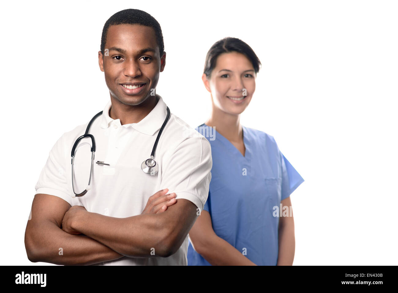 Certains hommes et femmes Medical Professionals Smiling at the Camera, isolé sur fond blanc. Banque D'Images
