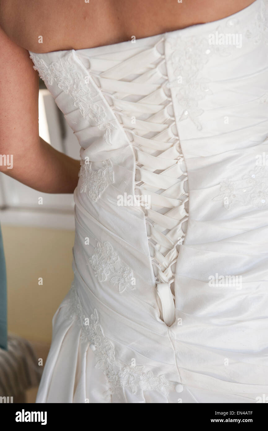 Dos d'une robe de mariage par correspondance montrant closeup détail de  laçage corset Photo Stock - Alamy