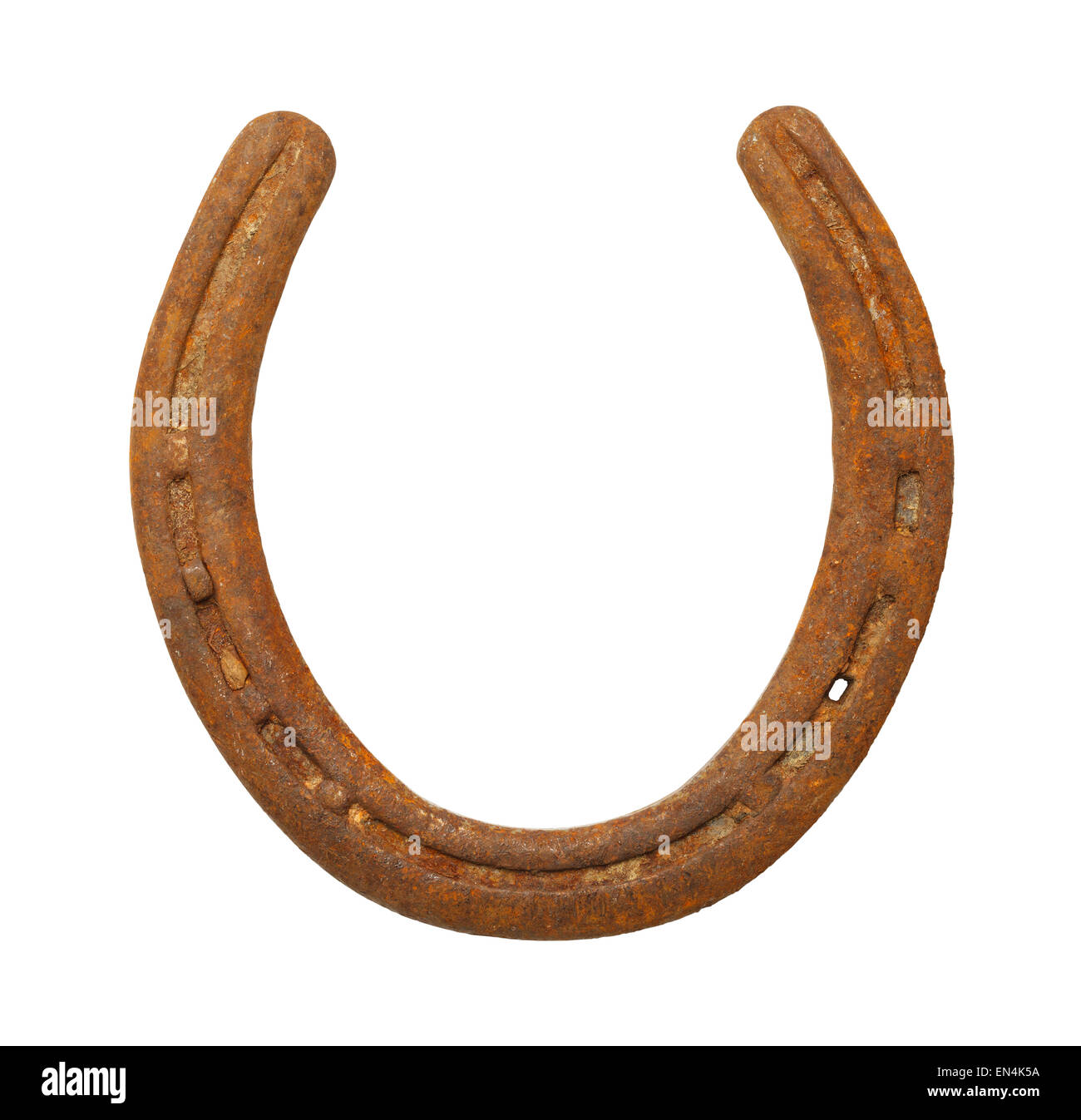 Rusty Old Horse Shoe isolé sur un fond blanc. Banque D'Images