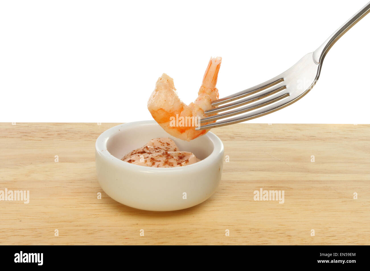 Sur une fourchette de Crevettes en sauce aux fruits de mer de trempage Banque D'Images