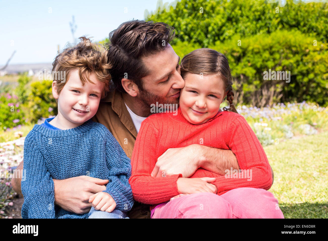 Heureux père avec ses enfants Banque D'Images