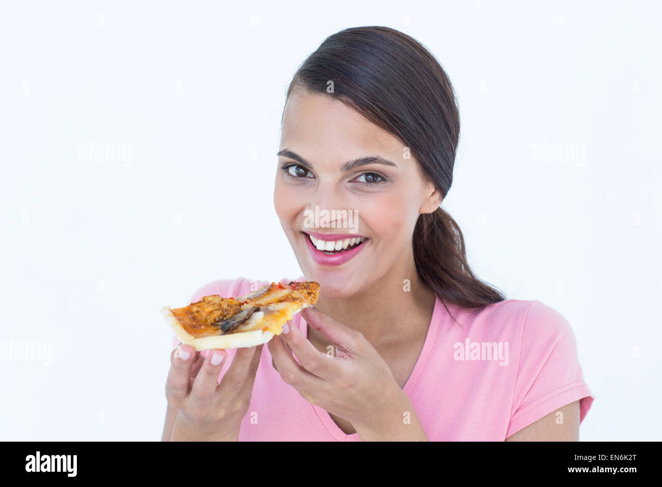 Belle femme de manger une pizza Banque D'Images