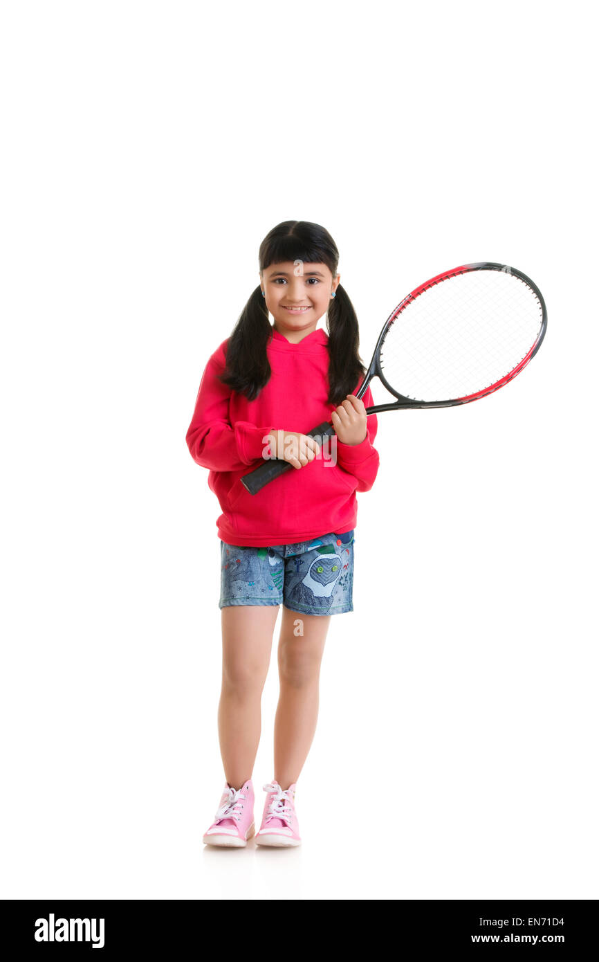 Girl holding tennis racquet Banque D'Images