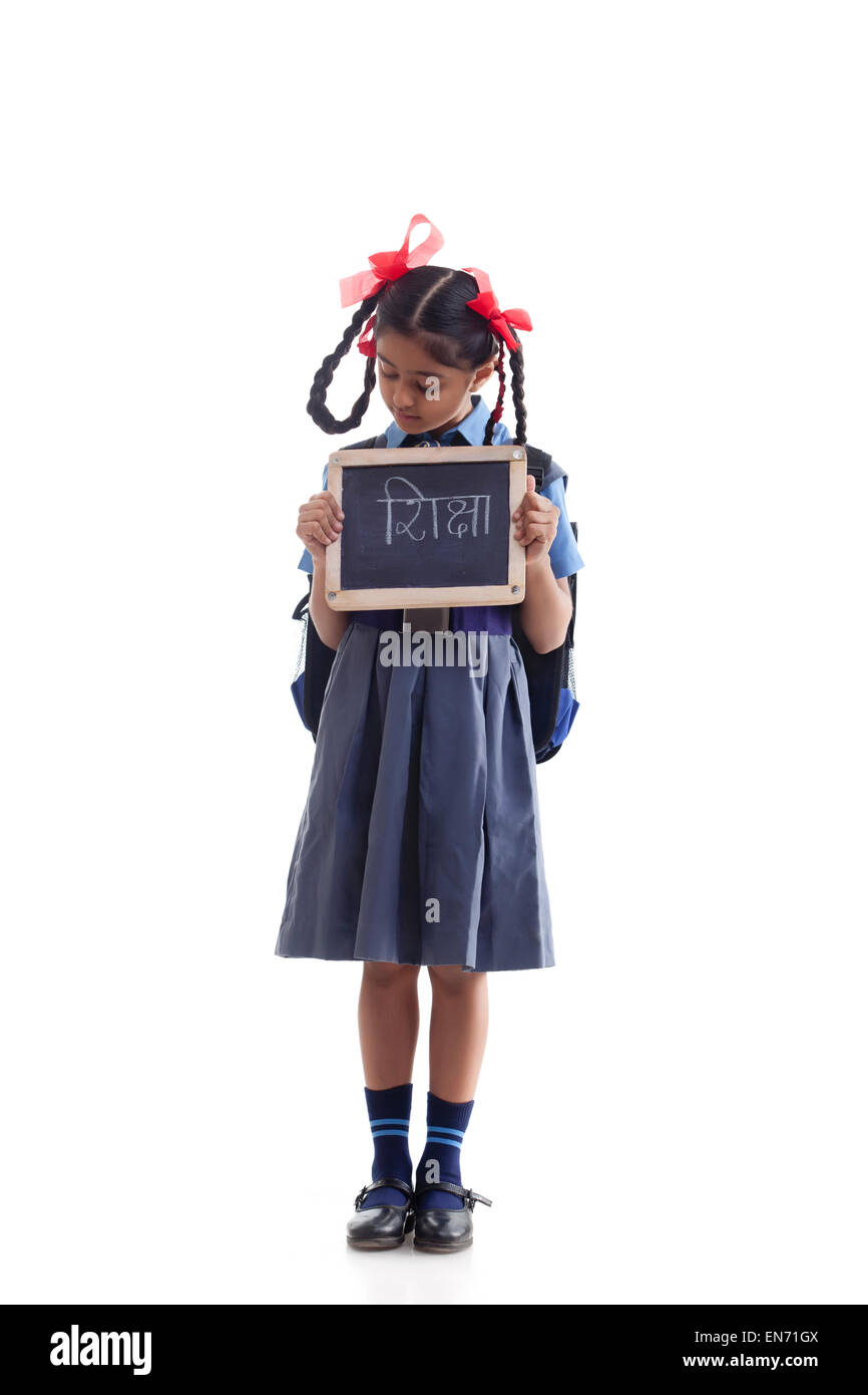 School girl holding slate Banque D'Images