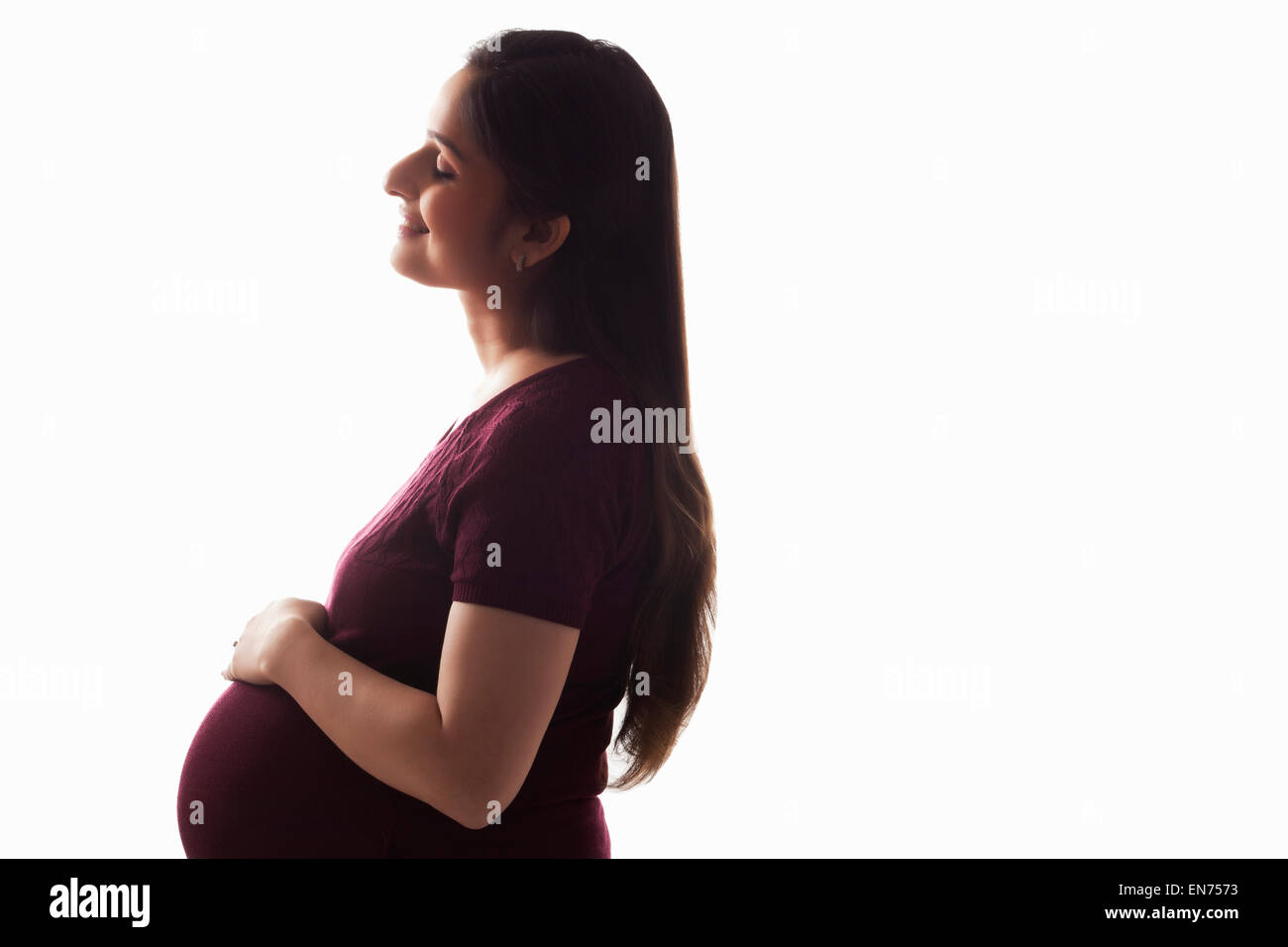 Pregnant woman smiling Banque D'Images