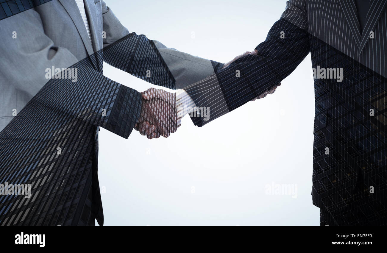 Image composite de handshake en accord Banque D'Images