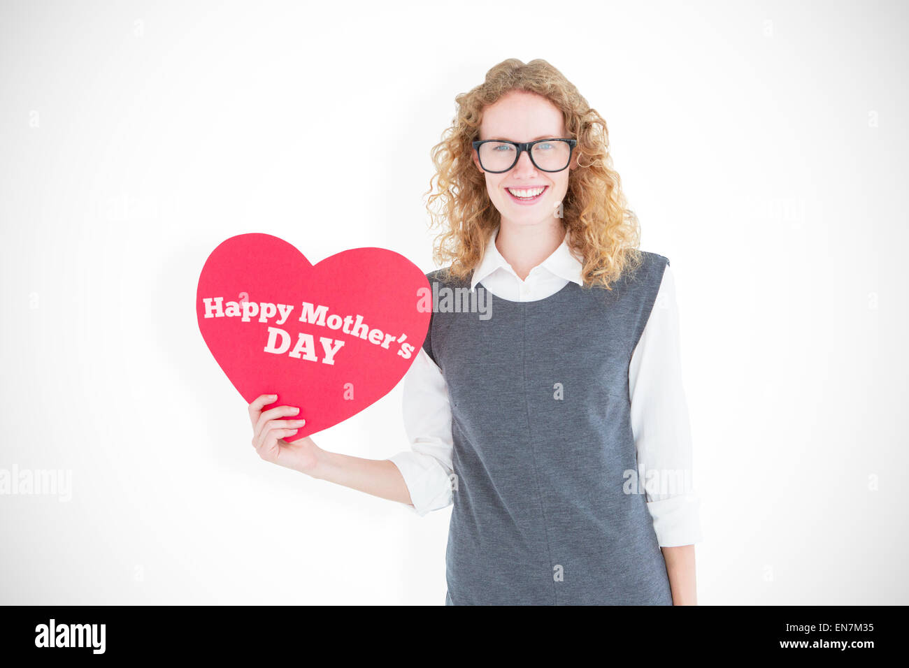 Image composite de hipster geek carte holding heart Banque D'Images