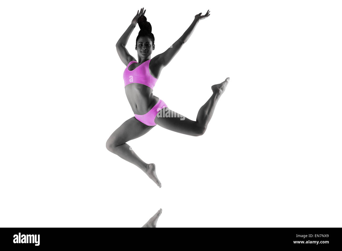 Image composite de la fit sauter et brunette posing Banque D'Images