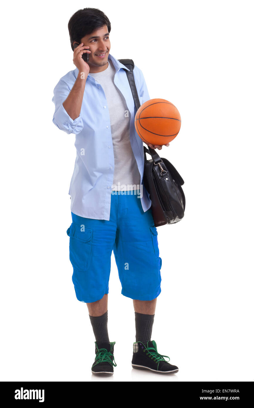 Portrait of Young man talking on mobile phone Banque D'Images