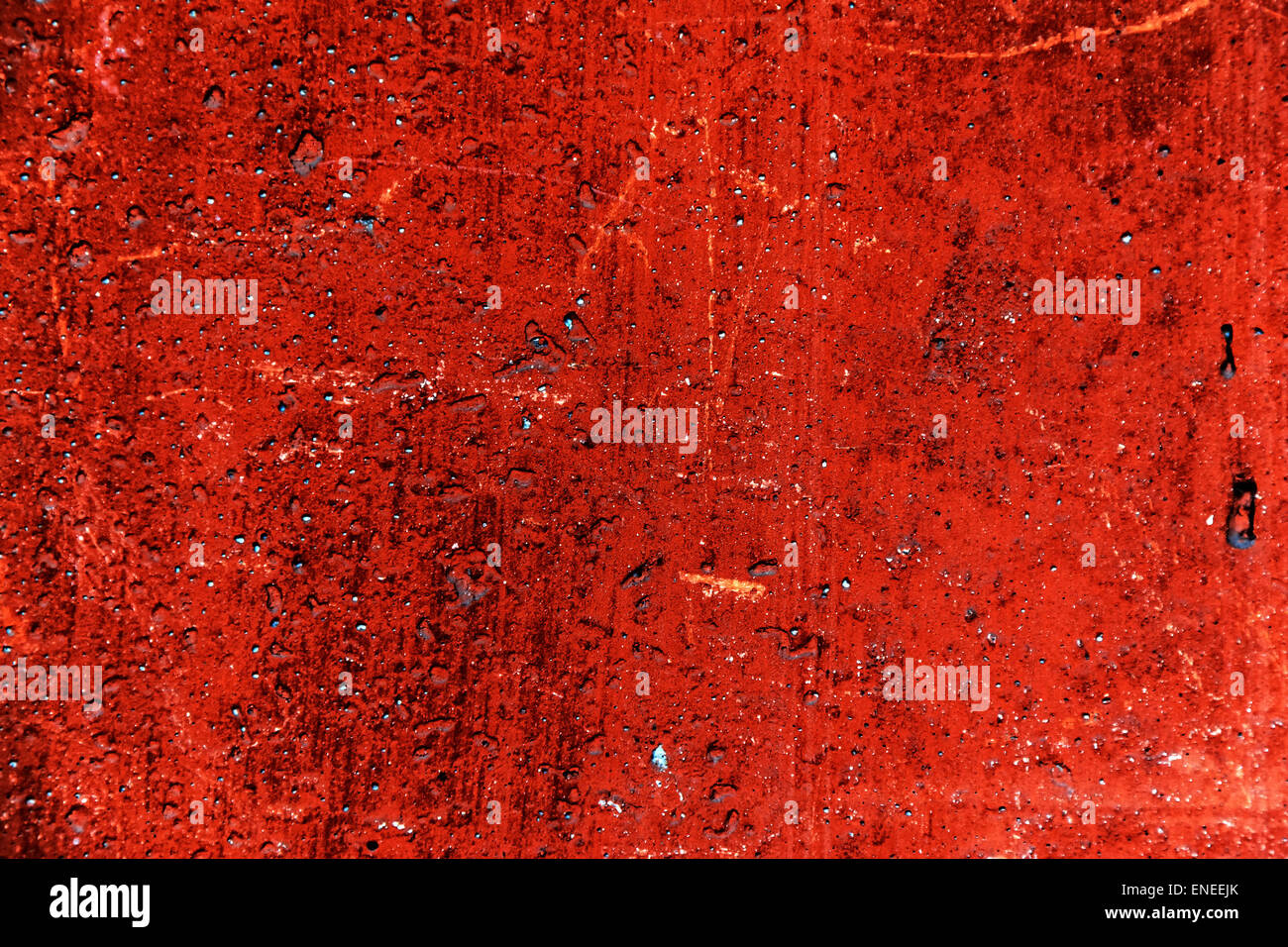 Plâtre ou ciment grunge texture mur de béton de couleur rouge avec des rayures Banque D'Images