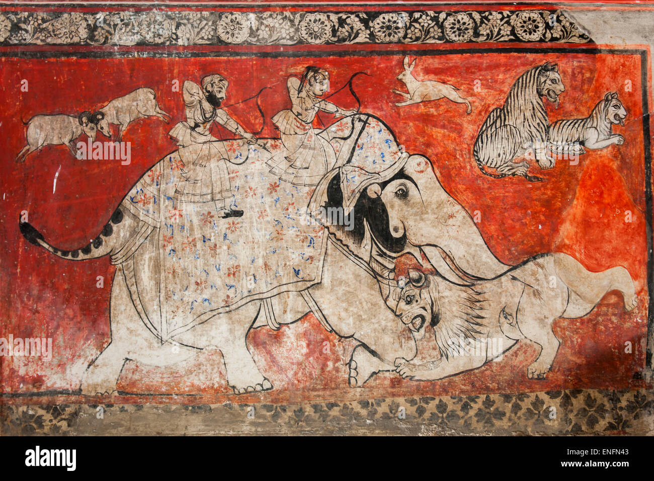 Ancienne peinture murale représentant une chasse au lion dans le Palais de la ville du Maharaja, fresque, Udaipur, Rajasthan, Inde Banque D'Images