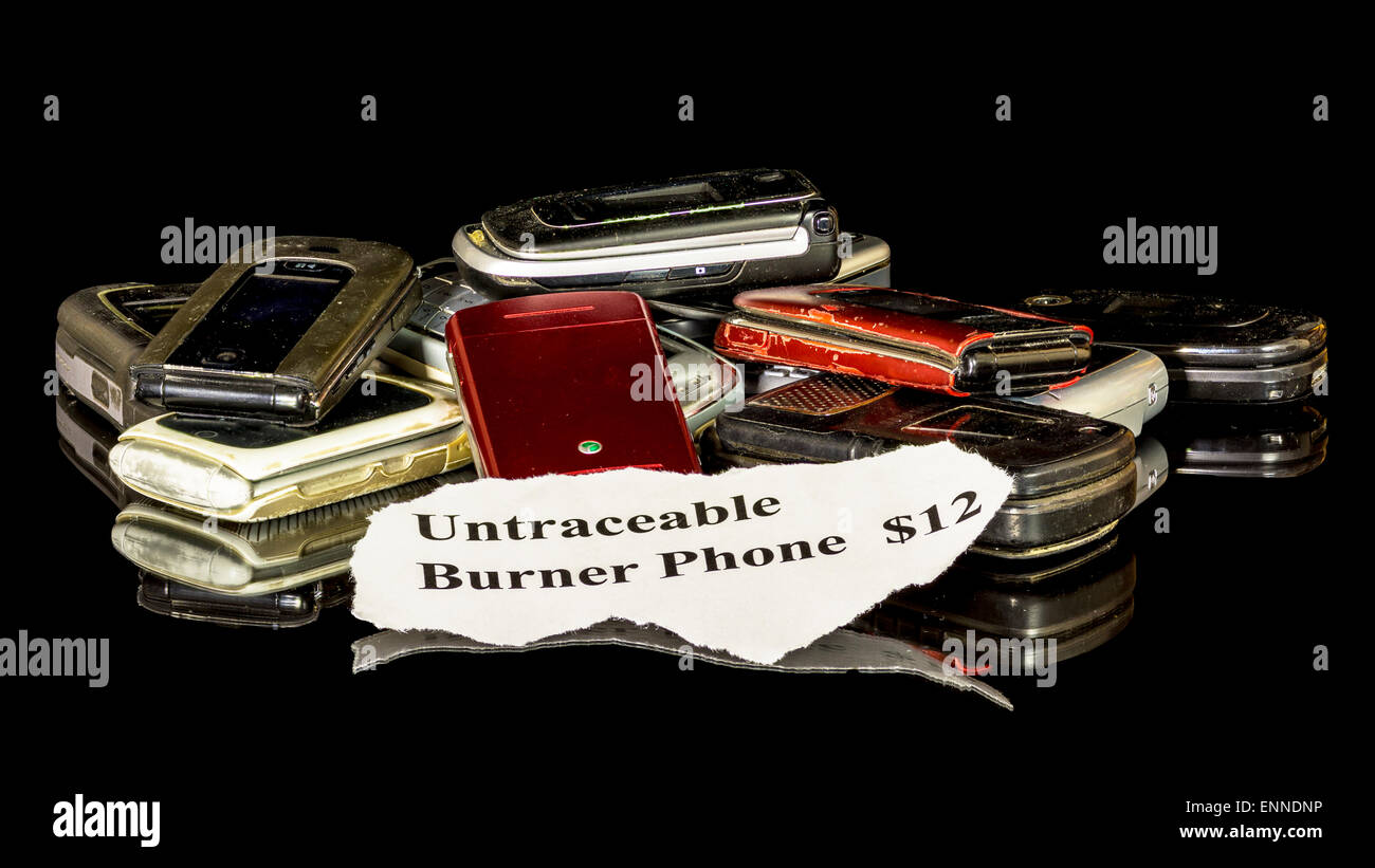Téléphones cellulaires usés et brûleur à vendre Banque D'Images
