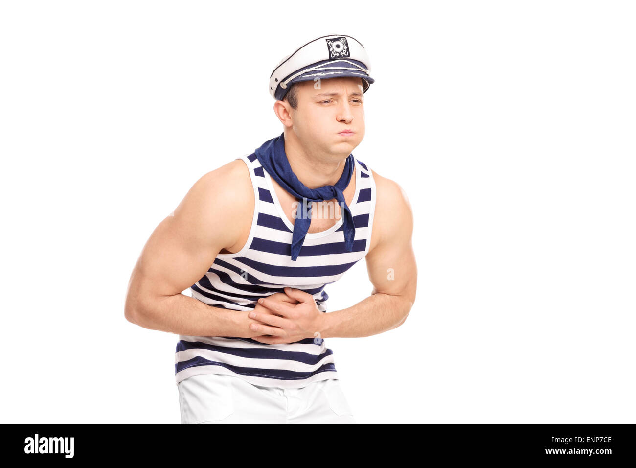 Young male sailor sentiment d'estomac isolé sur fond blanc Banque D'Images