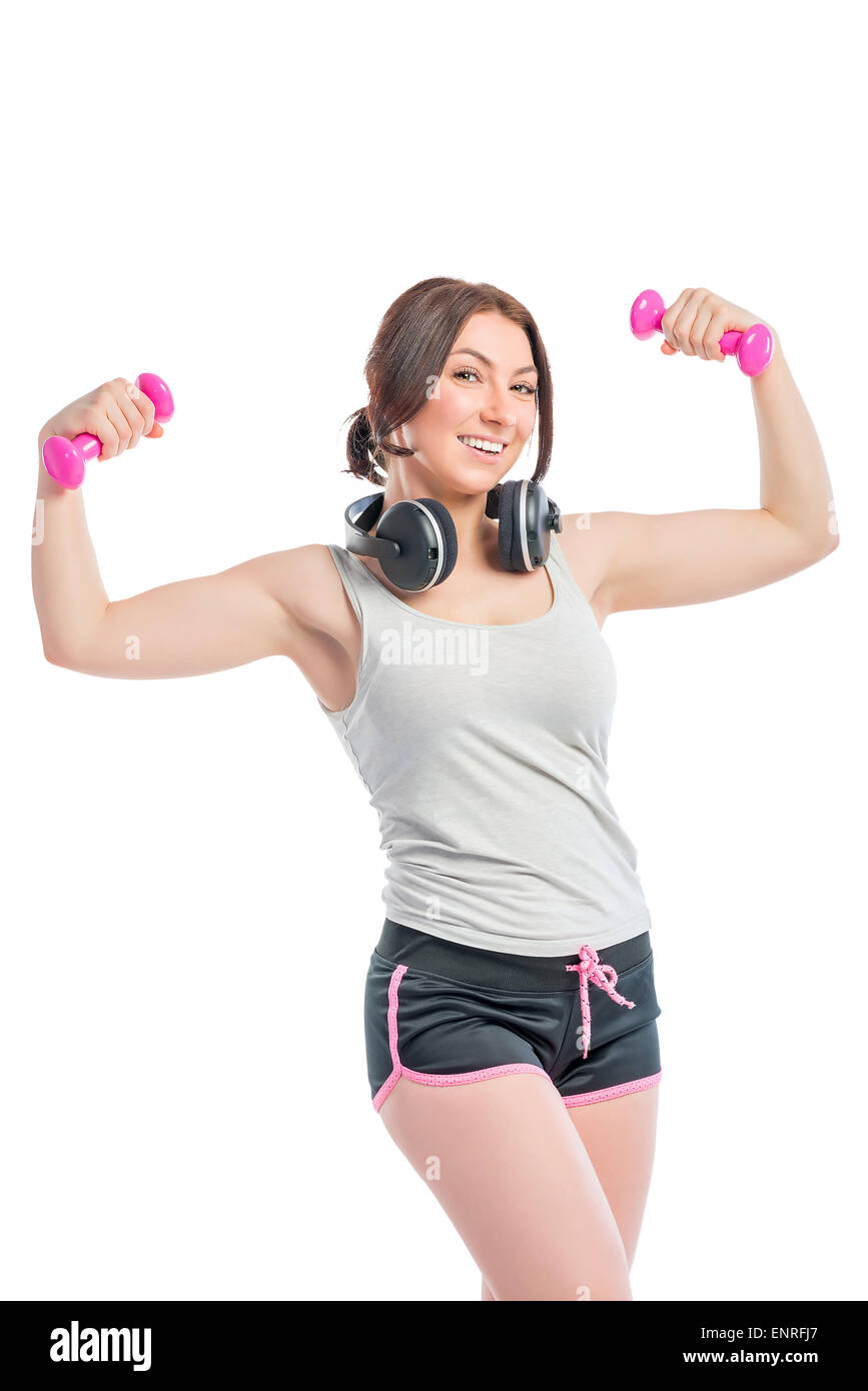 Trainer avec un haltère et casque sur un fond blanc Banque D'Images
