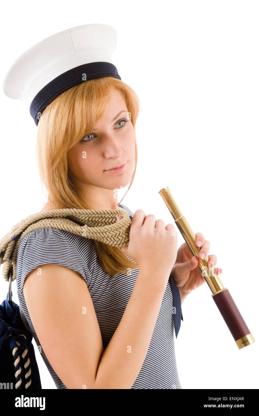 Young marine woman with spyglass dans sailor hat Banque D'Images