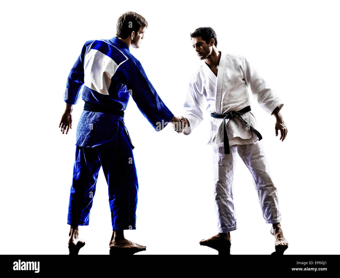 Deux soldats combattants judokas handshake en silhouette sur fond blanc Banque D'Images