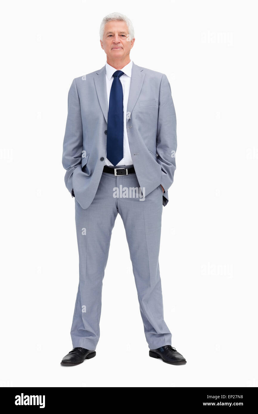 Portrait d'un homme avec ses mains dans ses poches Banque D'Images