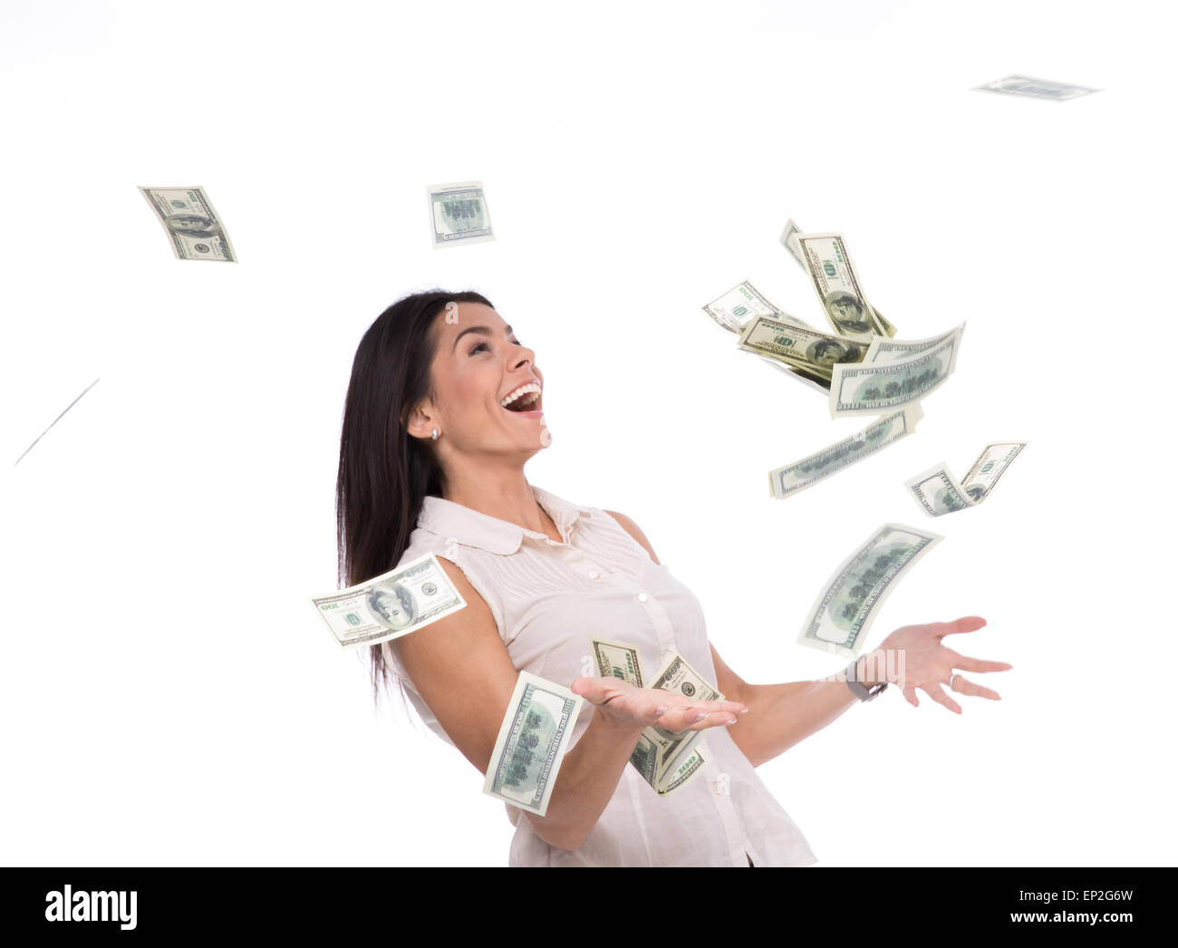 Cheerful businesswoman sous la pluie d'argent sur fond blanc. Jusqu'à la Banque D'Images