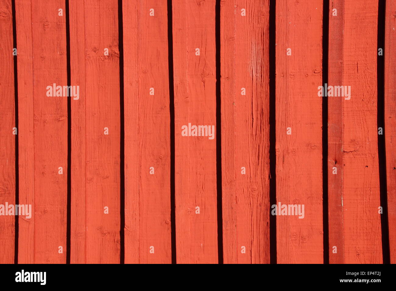 En bois peint rouge porté mur de plank background Banque D'Images