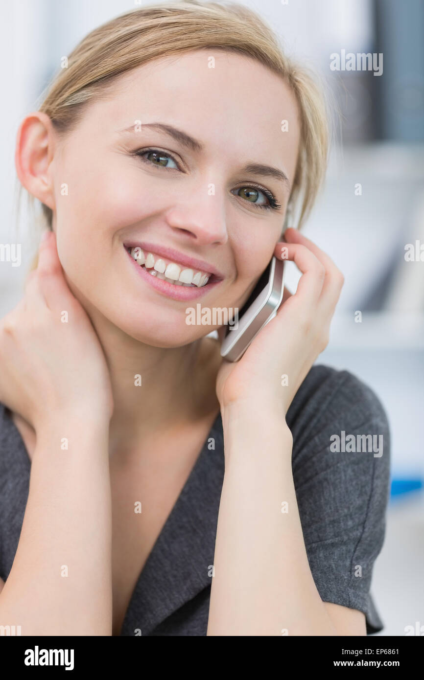 Closeup portrait of business woman using mobile phone Banque D'Images