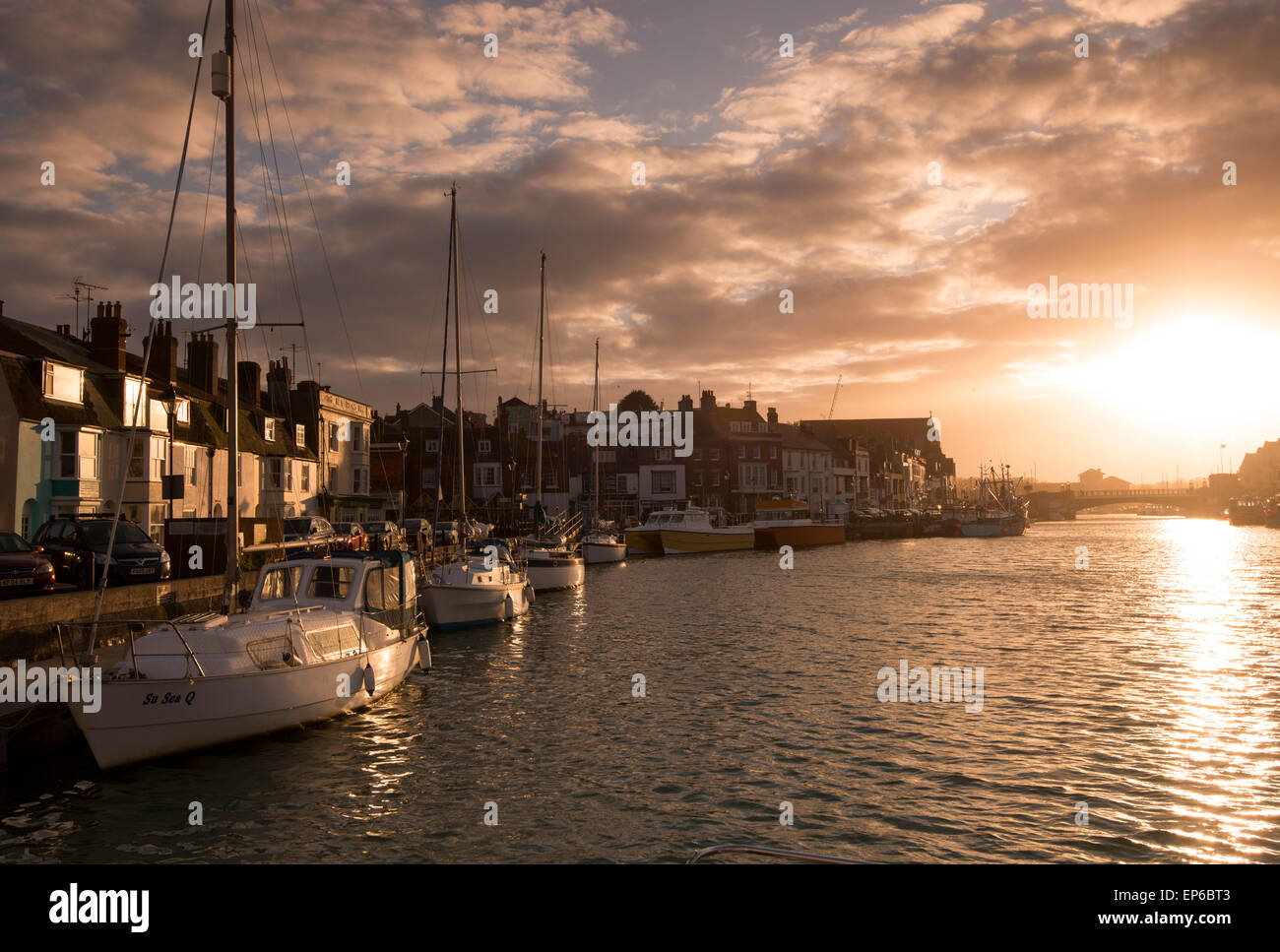 Coucher du soleil dans le port de Weymouth, Dorset, Angleterre, Royaume-Uni Banque D'Images