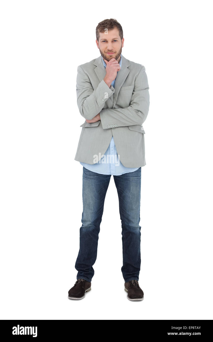 Thoughtful model posing dans blazer looking at camera Banque D'Images