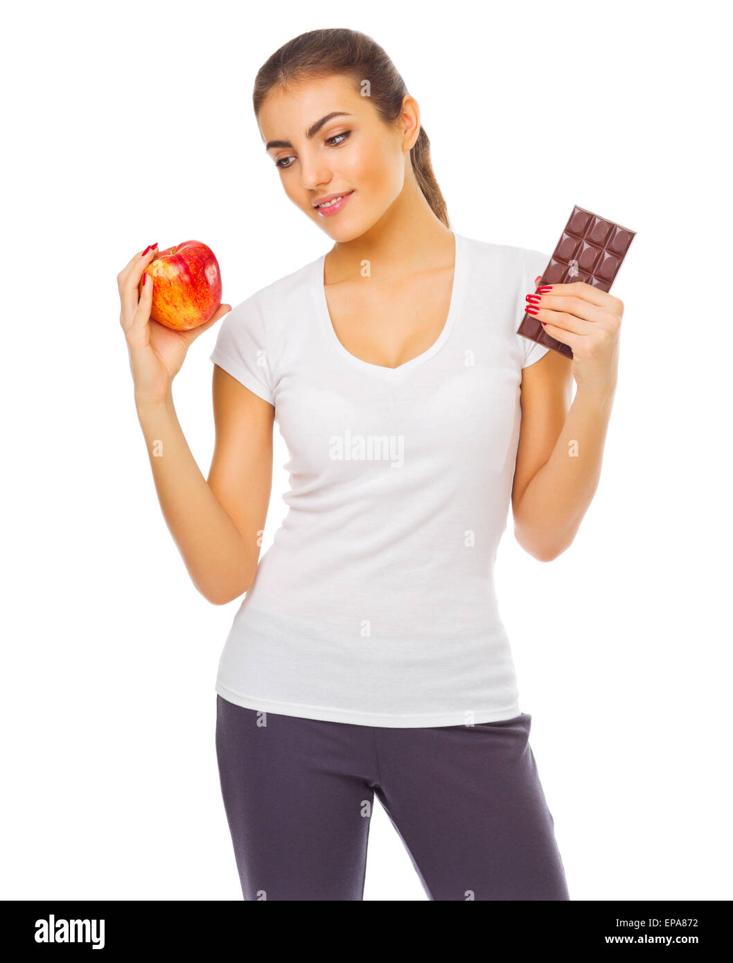 Jeune fille avec apple et isolé au chocolat Banque D'Images