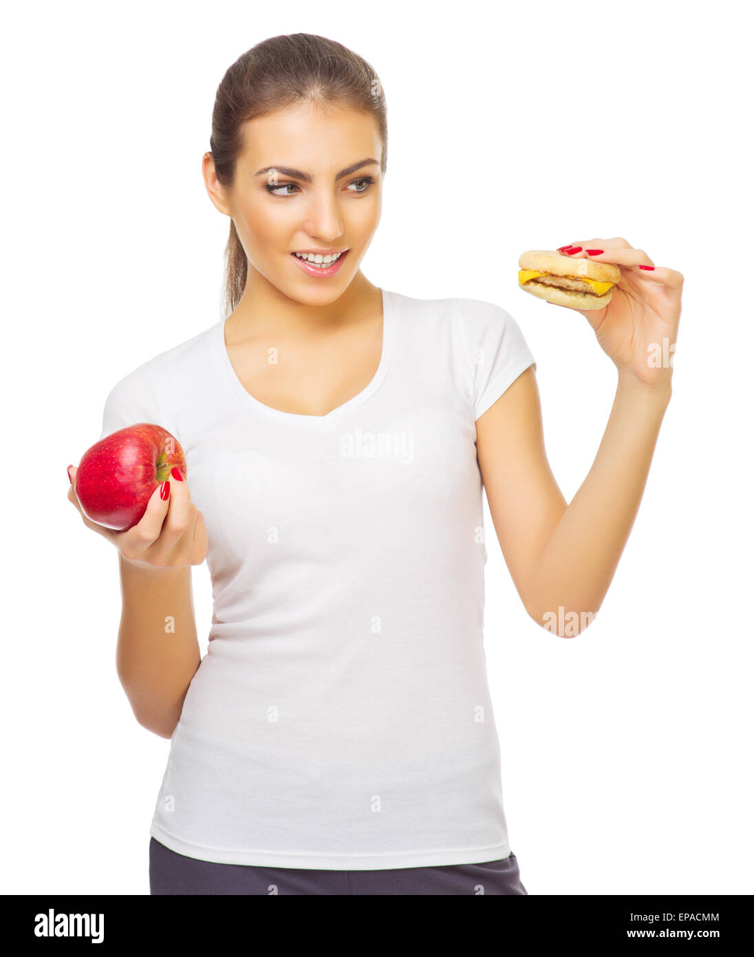 Jeune fille avec apple et isolées du hamburger Banque D'Images