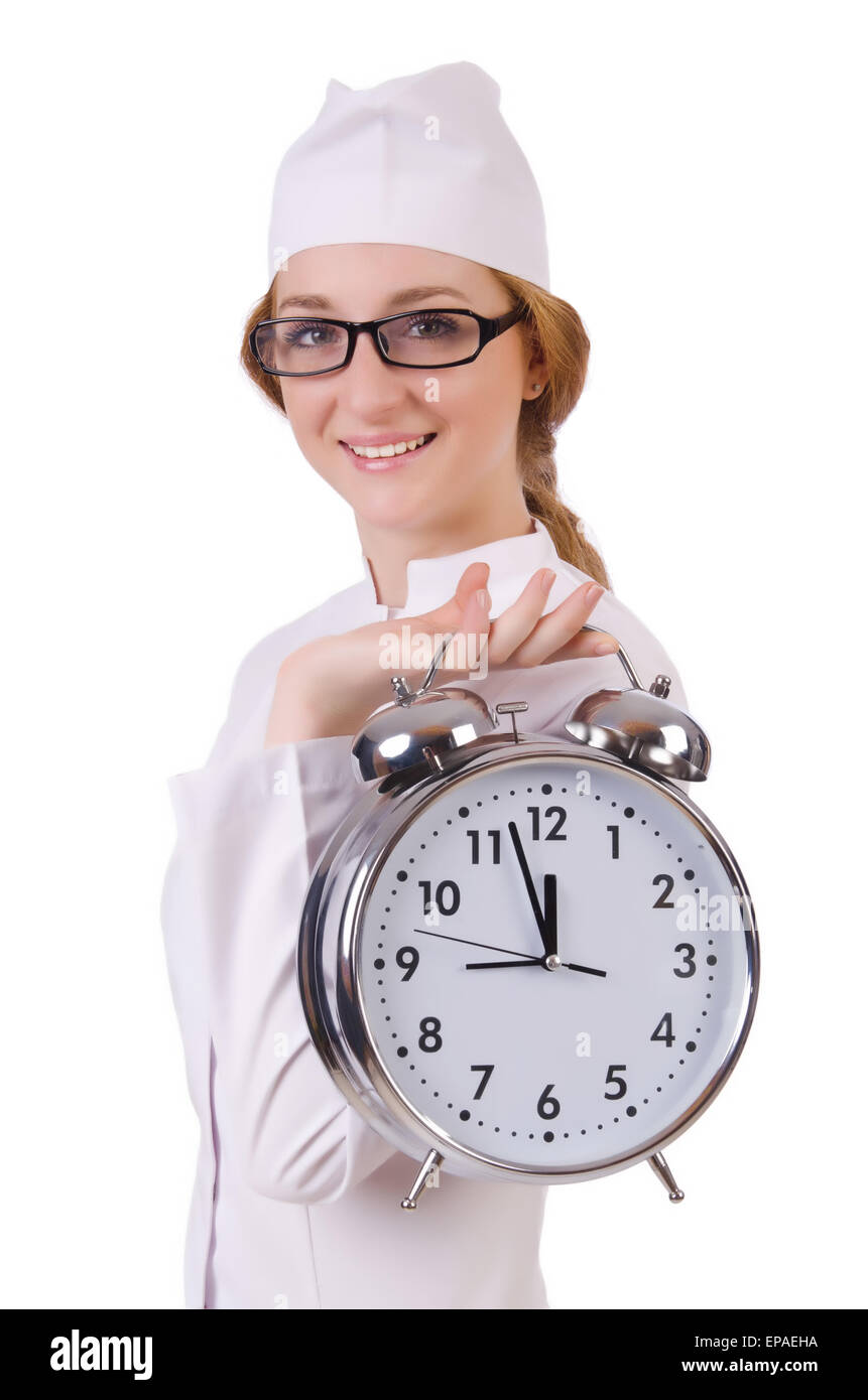 Jolie femme médecin avec grosse horloge isolated on white Banque D'Images