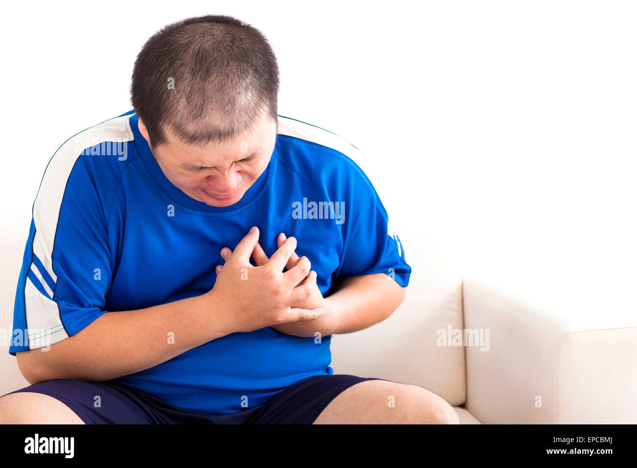 Young fat man s'attaque cardiaque Banque D'Images