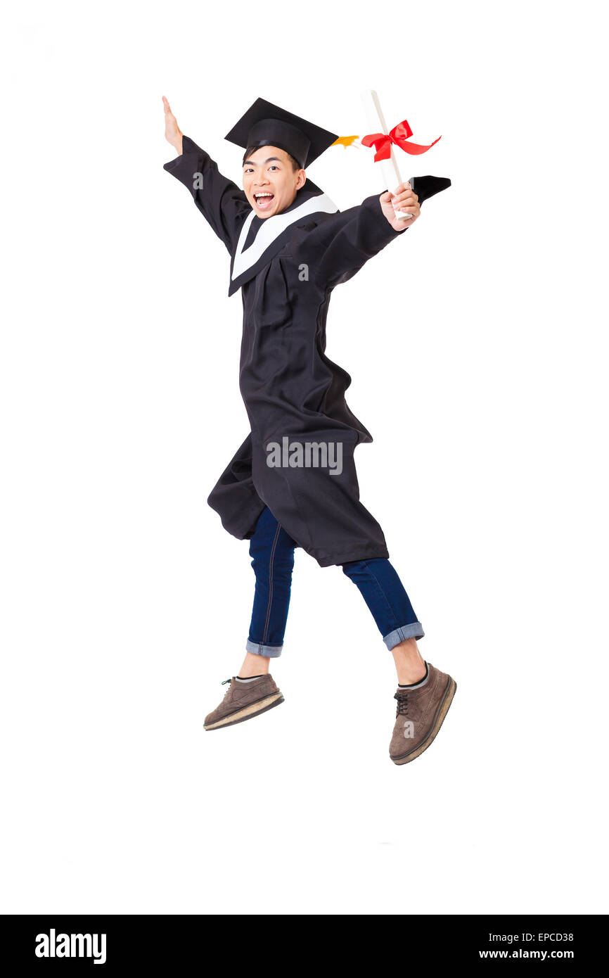 Étudiant diplômé en heureux robe jumping isolated on white Banque D'Images