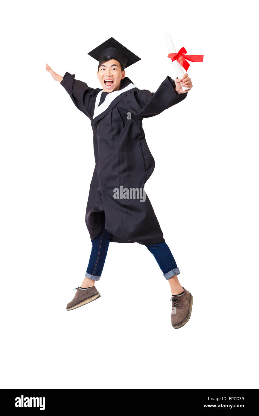 Étudiant diplômé en heureux robe jumping isolated on white Banque D'Images