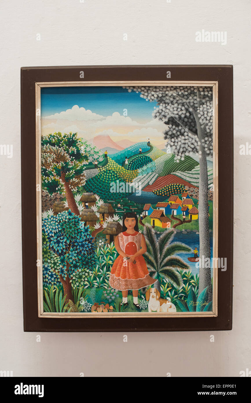 Alvaro Gaitan la Nina peinture Grenade Nicaragua // GRENADE, Nicaragua — la peinture la Nina, 1987 de l'artiste nicaraguayen Alvaro Gaitan est exposée au Centro Cultural Convento San Francisco, une institution culturelle de premier plan à Grenade. L'œuvre, créée au cours d'une période turbulente de l'histoire du Nicaragua, fait partie de la collection permanente du musée des régions protégées Le centre culturel se trouve dans un couvent franciscain du XVIe siècle méticuleusement restauré, l'une des plus anciennes structures coloniales d'Amérique centrale. Situé près du Parque Central dans le quartier historique de Grenade, le musée s Banque D'Images