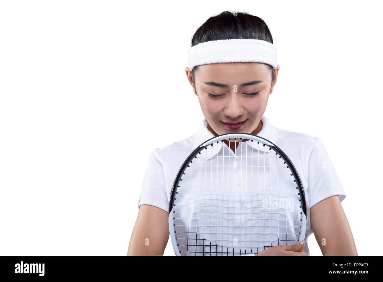 Tennis player hugging raquette de tennis Banque D'Images