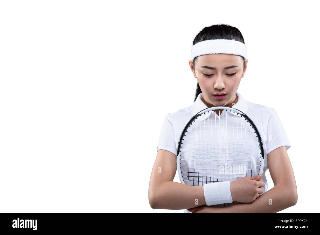 Tennis player hugging raquette de tennis Banque D'Images