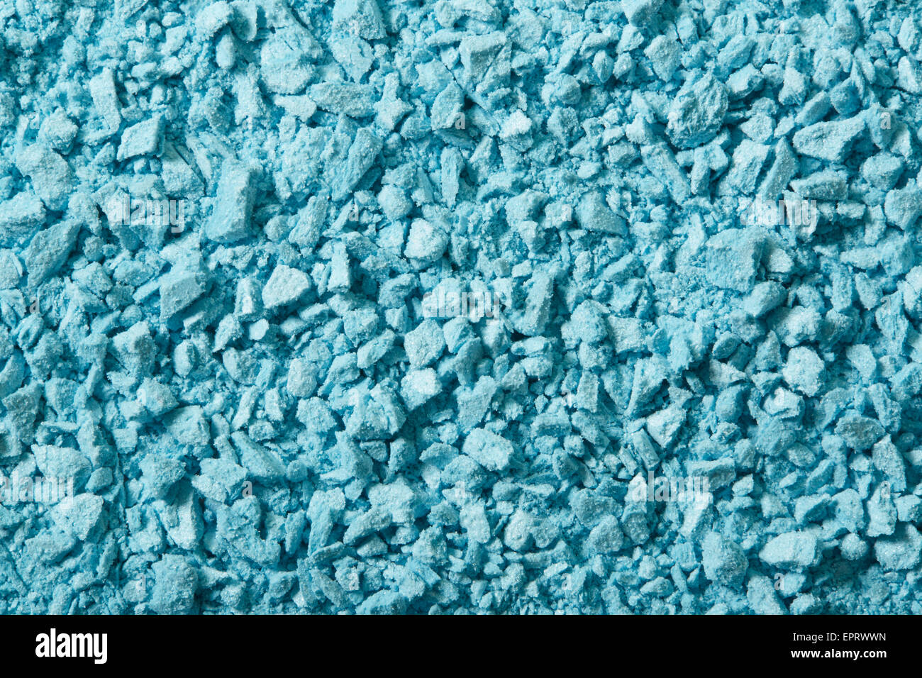 Ombre à paupières bleu poudre cosmétique broyée, texture background Banque D'Images